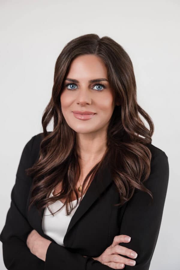 Attorney Stephanie McQueen-Arthur with arms crossed